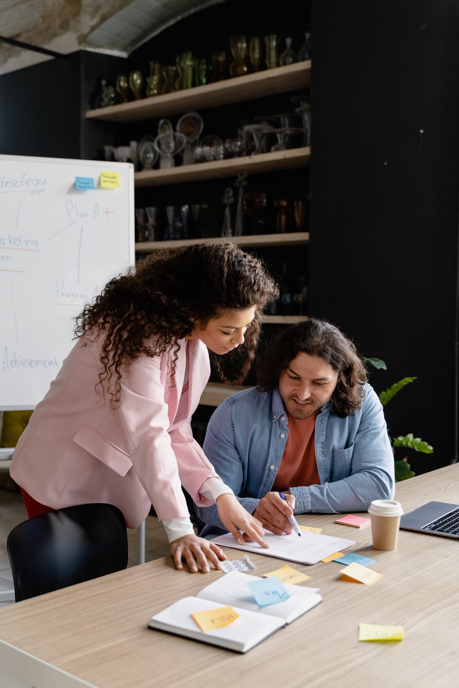 Male and Female Coworkers Brainstorming in the Office